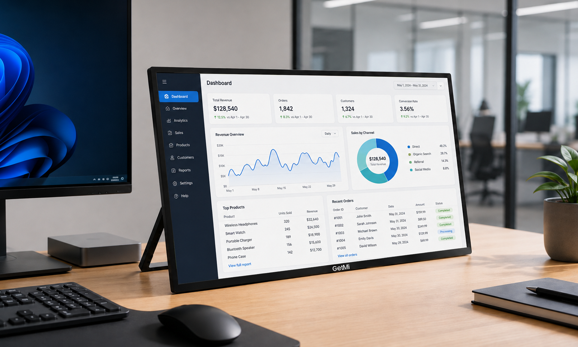 GetMi P238 monitor in a desktop workspace